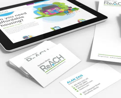Closeup of NI ReACH logo on stationery and tablet