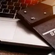 laptop and movie sign with notebook