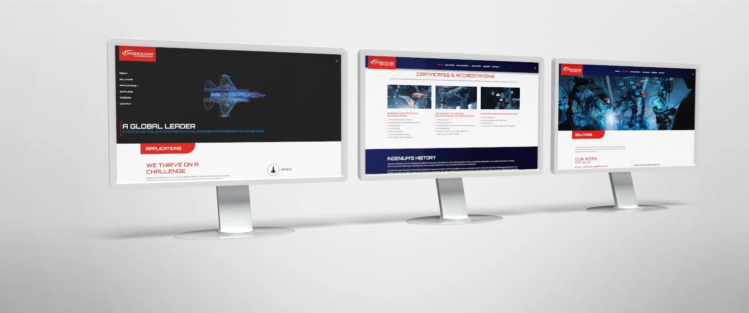 3 monitors showing Ingenium Aerospace website