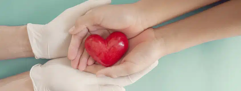 hands holding heart for healthcare emotional branding