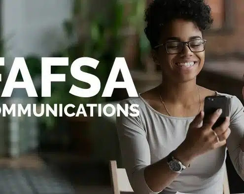 Woman holding phone while cheering for FAFSA Communications