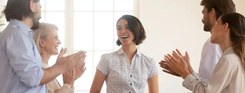 group of people clapping