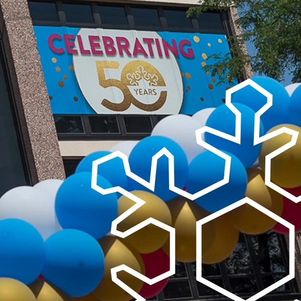 balloon arch in front of BHS anniversay banner